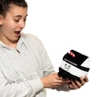 Person holding a novelty sock with text and graphics on a white background