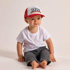 Model wearing Grom Squad DUDE Trucker Hat - Red/White