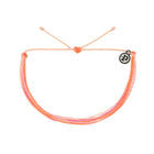 bracelet with pink and orange gradient cord on a white background