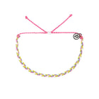 Colorful braided bracelet with a logo charm on a white background
