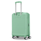 Mint green suitcase with a textured surface on a white background