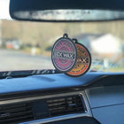 Mr. Zog's Sex Wax Air Freshener - Strawberry inside a car