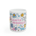 White mug with colorful 'Santa Monica' design on a white background