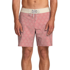 Pink patterned swim shorts worn by a person on a plain background