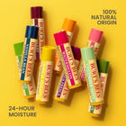 Burt's Bees lip balm tubes on a yellow background with product names and features displayed.