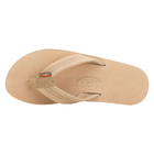 A single light tan leather flip-flop sandal shown from a top-down view on a white background, featuring a small colorful Rainbow brand tag on the strap and the brand name printed on the footbed.