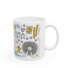 White mug with colorful illustrations on a white background