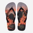 Pair of Havaianas Top Surfer I with sunset design and palm trees on a white background