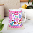 Colorful mug with graphics on a white surface