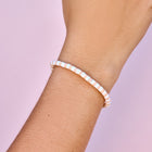 Model wearing Pura Vida Sandalwood Seascape Stretch Bracelet