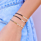 Model wearing Pura Vida Monochrome Stretch Bracelet Set Of 3
