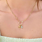 Pura Vida Harper Palm Tree Charm in a model's necklace