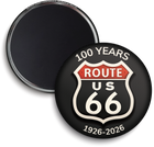 Round magnet celebrating 100 years of Route US 66 with black background