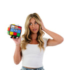 Woman holding a colorful Rubik's Cube-shaped object with text on a white background