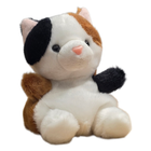 Plush toy cat with black, white, and brown fur on a white background