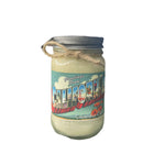 Jar of cream with a decorative label on a textured surface