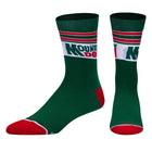 Green socks with red and white accents on a white background