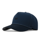 Navy blue baseball cap with perforated design on a white background