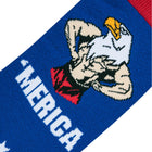 Close-up of a sock with an eagle design and 'MERICA text on a blue background