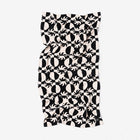 Black and white patterned tube top on a white background