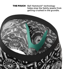 Close-up of a pet hammock showing the interior design with a black and white mechanical parts pattern, a green V-shaped support insert, and text explaining the Ball Hammock® technology.