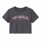 A dark gray cropped short-sleeve t-shirt with 'LOS ANGELES CALIFORNIA' printed in pink on the front, displayed against a solid white background.
