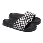Side view of black /true white La Costa Checkerboard Slide-On Sandal showing textured sole and padded checkered strap