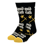 Black crew socks with a repeating gothic-style white 'liquid death' text pattern and gold crossed swords, featuring yellow toes and heels, shown on a plain white background.
