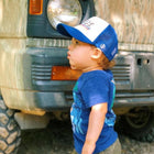 Model wearing Grom Squad DUDE Kids Hat - Royal/White
