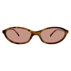 Sunglasses with tortoiseshell frame and pink lenses on a white background