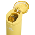 Yellow Stanley water bottle with cap off on a white background