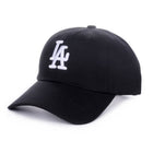 Black baseball cap with white logo on a white background