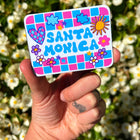 Model holding Santa Monica Magnet