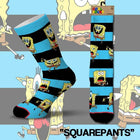 Three pairs of novelty crew socks featuring SpongeBob SquarePants characters on a black and light blue striped background. The left sock is shown on a foot form, while the other two pairs are displayed flat.