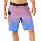Multicolored striped shorts worn by a person on a white background