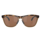 A pair of sunglasses with a translucent brown and black tortoiseshell frame and brown lenses, shown from a front-facing perspective on a light gray background.