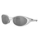 Oval sunglasses with a metallic silver frame and dark gray lenses, displayed on a light gray reflective surface.