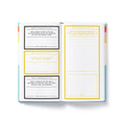 Open book with printed text and design on a white background