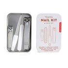 Travel nail kit with tools and packaging on a white background