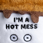Plush toy with text 'I'm a Hot Mess' on a white background