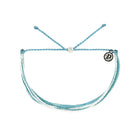 Blue braided bracelet with a pura vida logo on a white background
