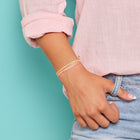 model wearing Pura Vida Good Fortune Bracelet
