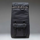 Black checkered backpack on a gray background