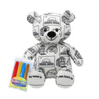 Colorable teddy bear with black and white designs and coloring supplies on a white background