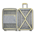 An open hard-shell suitcase with the telescoping handle extended, showing the interior layout. The suitcase has a light gray and white wavy patterned lining, a yellow-gold trim, a zippered organizer pocket on the left, and an X-buckle compression system on the right.
