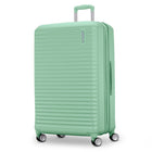Mint green suitcase with a visible brand logo on a white background
