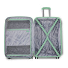 An open hardshell suitcase with a telescoping handle extended, showing the interior layout. The suitcase has mint green trim and straps over a gray and white wavy patterned interior.