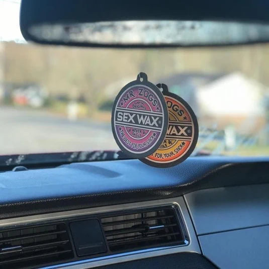 Mr. Zog's Sex Wax Air Freshener - Strawberry inside a car