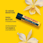 Burt's Bees Vanilla Bean lip balm on a yellow background with flowers