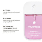 Touchland hand sanitizer with ingredients listed on a white background